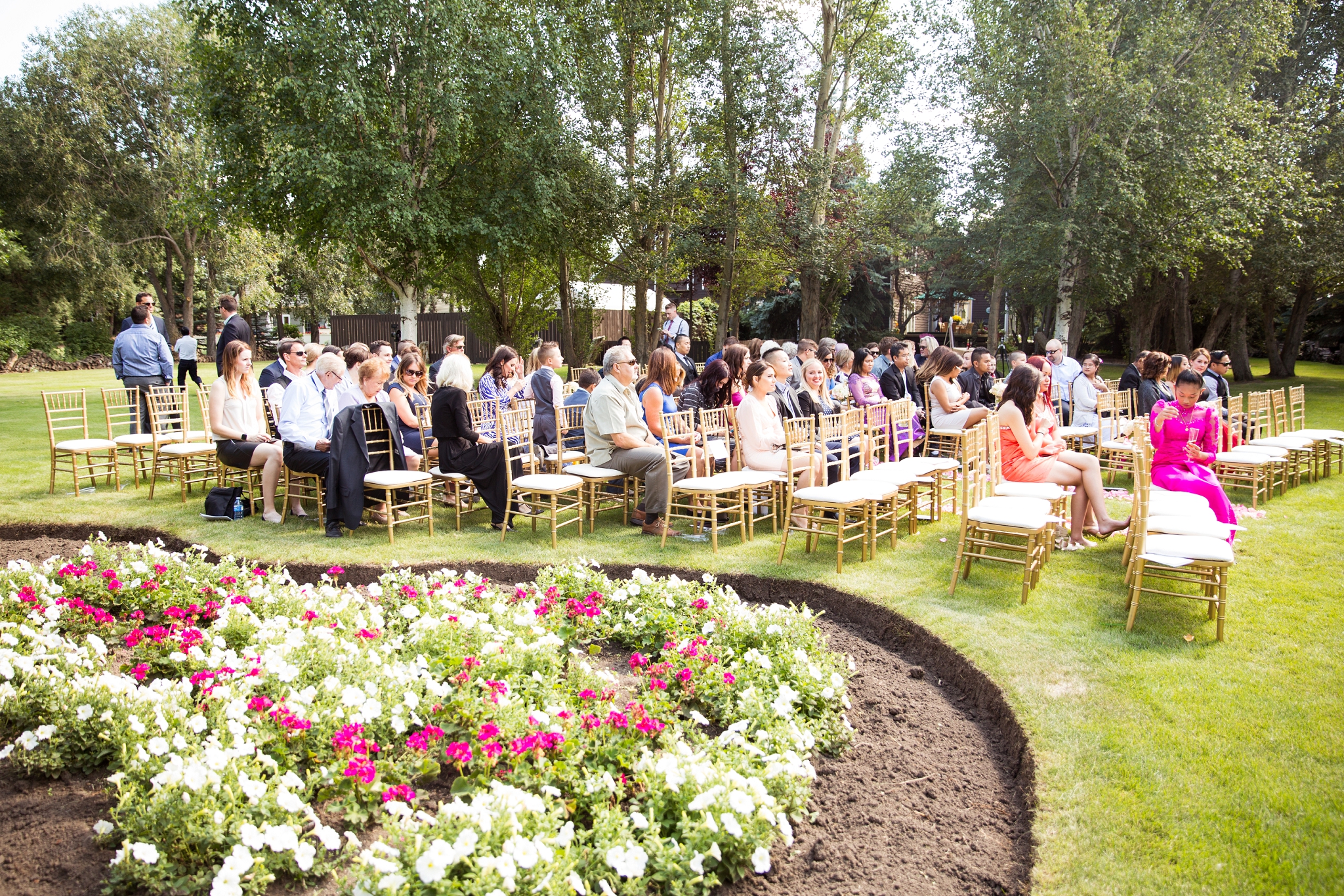outdoor wedding ceremony edmonton gold chiavari chairs