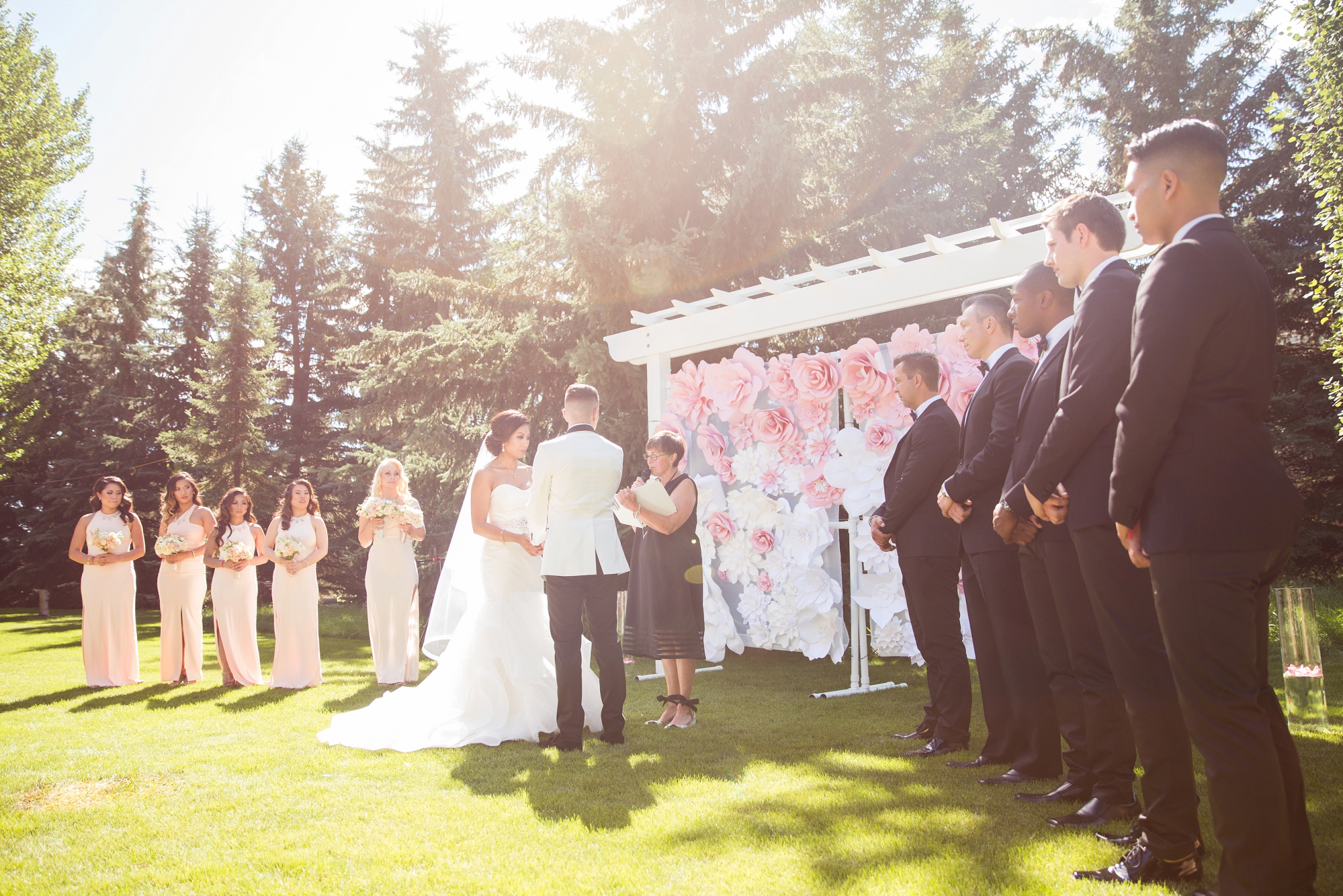outdoor wedding ceremony edmonton paper backdrop