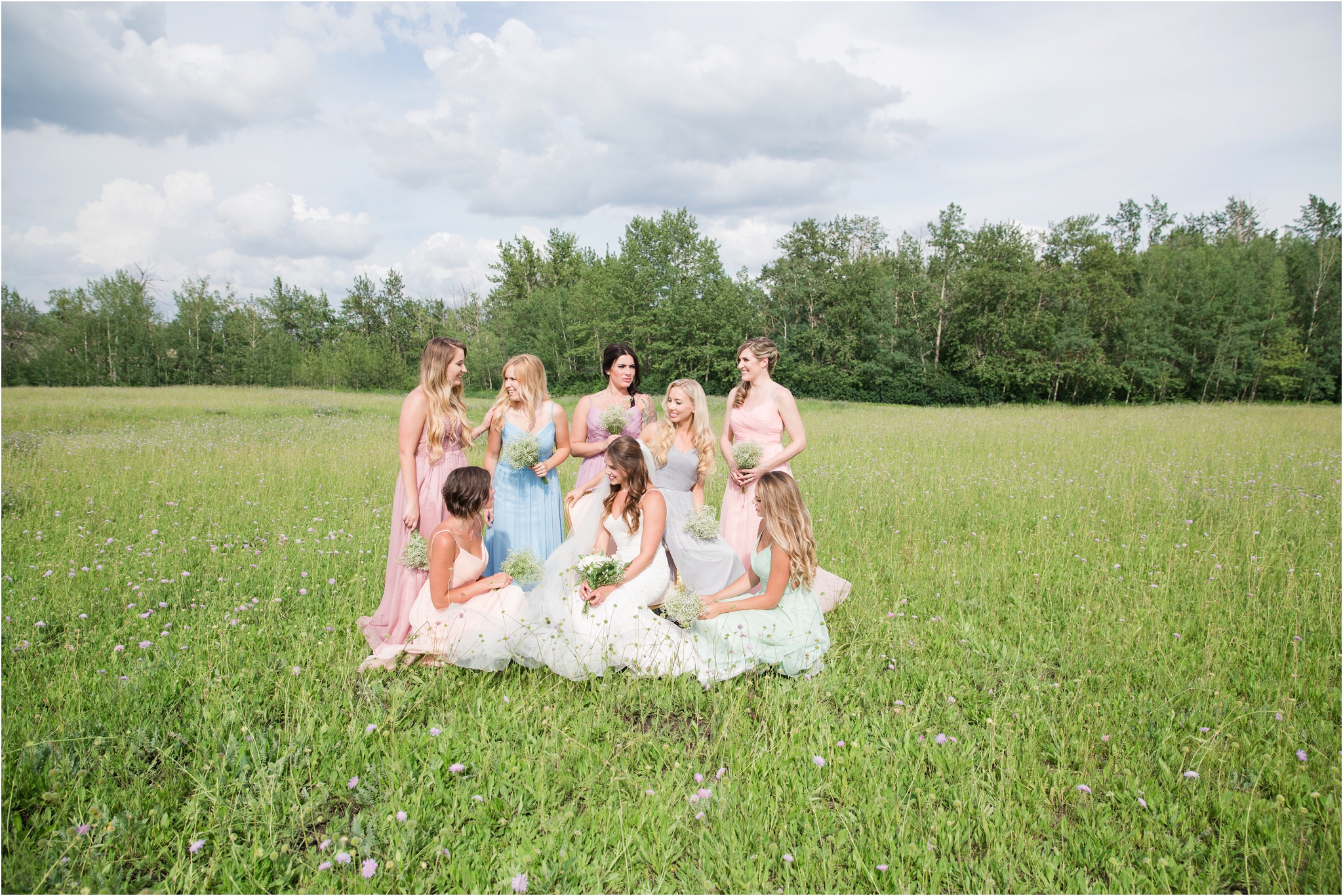 romantic field wedding photos edmonton nc photography pastel bridesmaid dresses