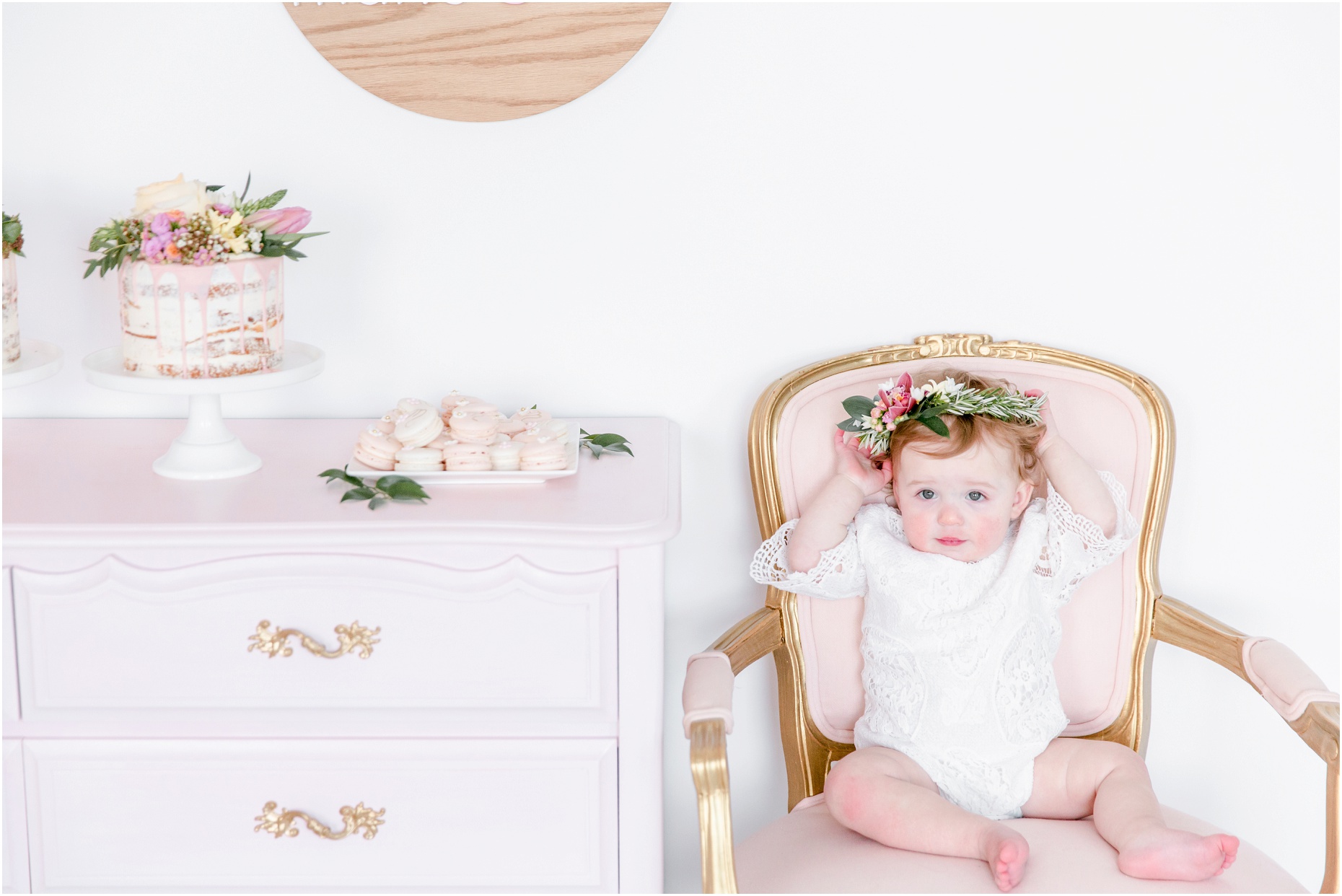 pink and white boho first birthday, first birthday photos, edmonton family photographer, twins, twin girls first birthday, the art of cake, nc photography, yeg photographer, floral crown, fabloomosity, party decor, balloon arch, balloon garland, mother and daughter photos, mommy and me floral crowns
